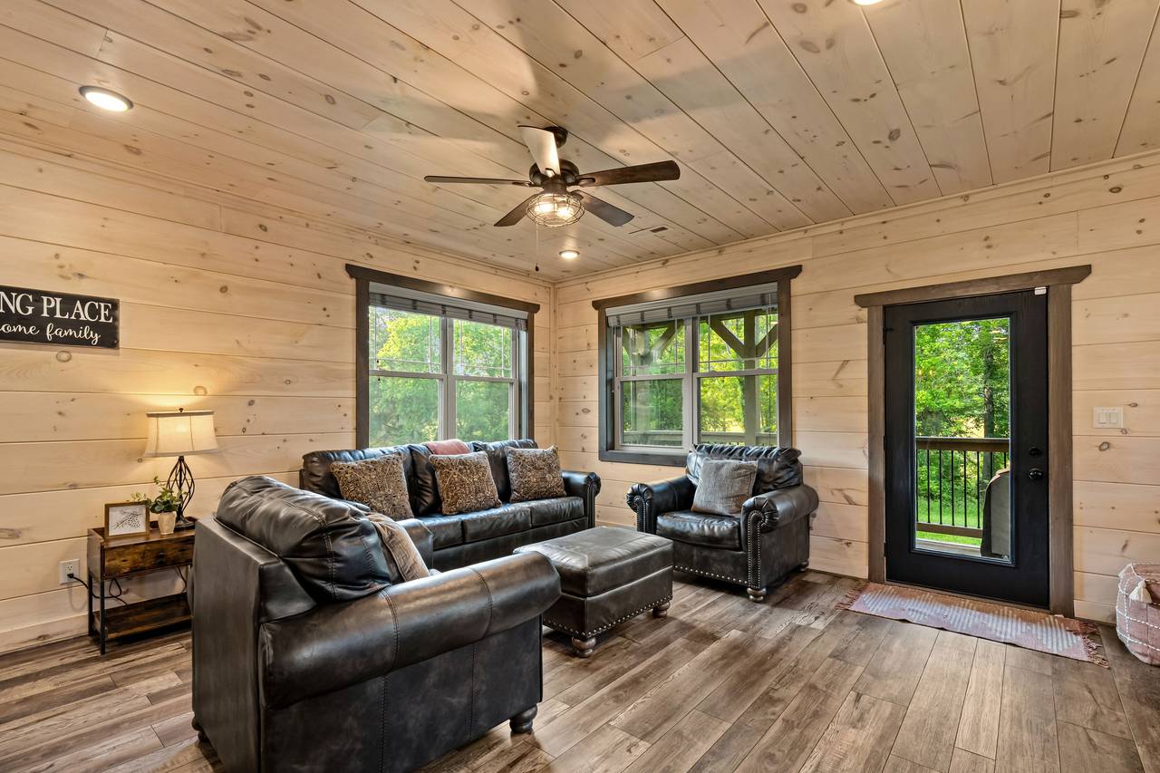 <span class="name">Spacious living room with plush seating & fireplace</span> <span class="name">Spacious living room with plush seating & fireplace</span>
