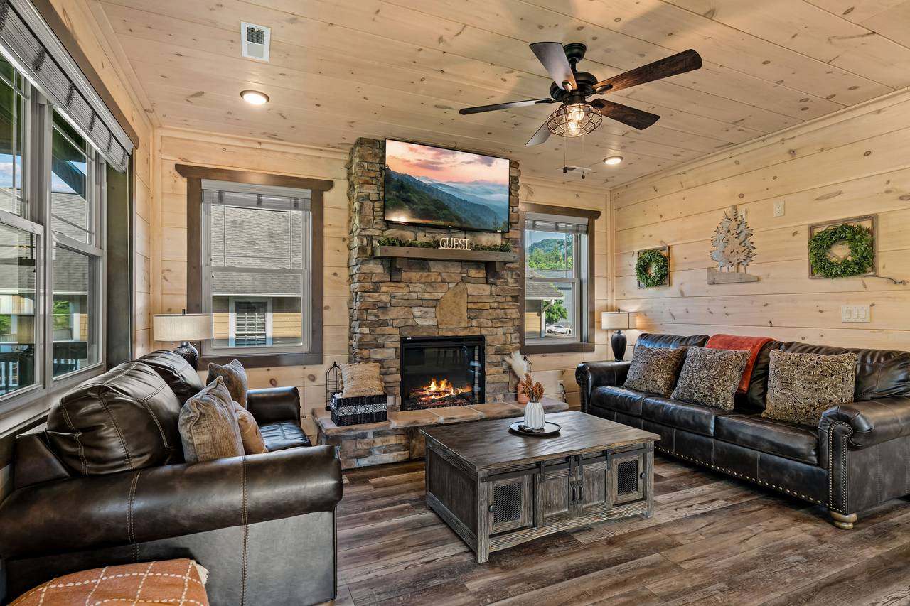 <span class="name">Spacious living room with plush seating & fireplace</span> <span class="name">Spacious living room with plush seating & fireplace</span>
