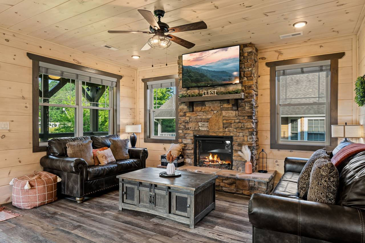 <span class="name">Spacious living room with plush seating & fireplace</span> <span class="name">Spacious living room with plush seating & fireplace</span>