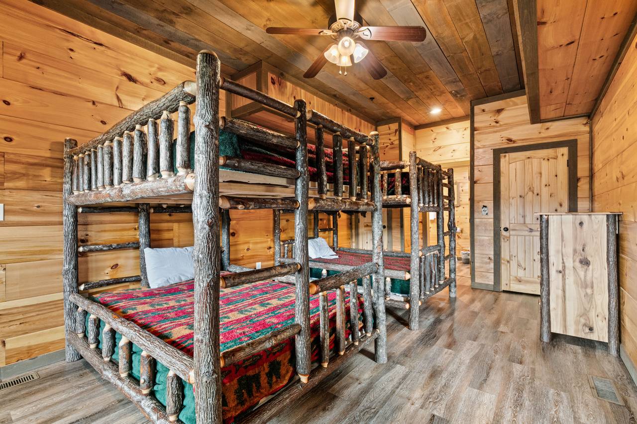 <span class="name">Lower level bunk room with full-over-full beds & TV</span> <span class="name">Lower level bunk room with full-over-full beds & TV</span>