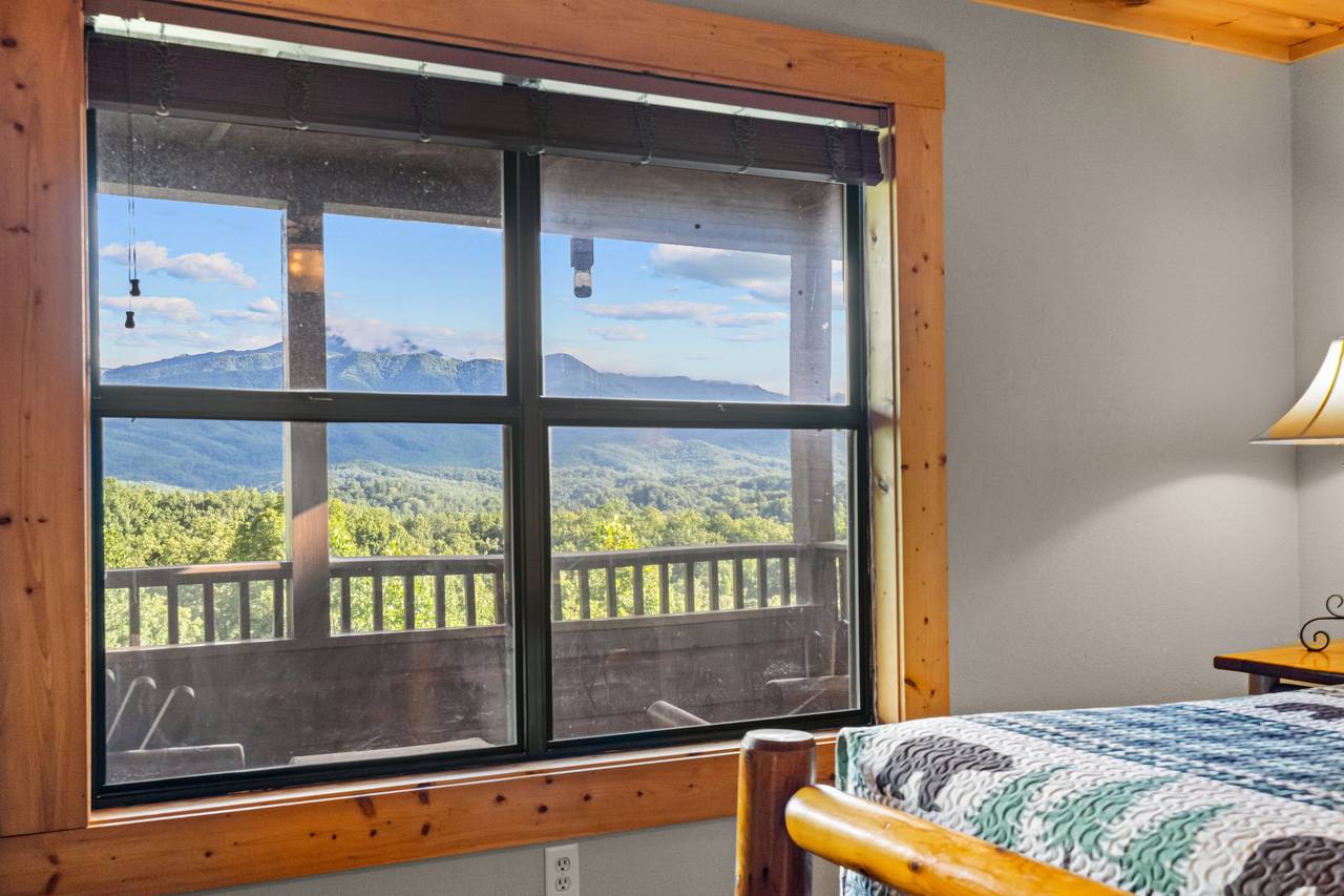 Upper level king bedroom with views, TV, and full bath Upper level king bedroom with views, TV, and full bath