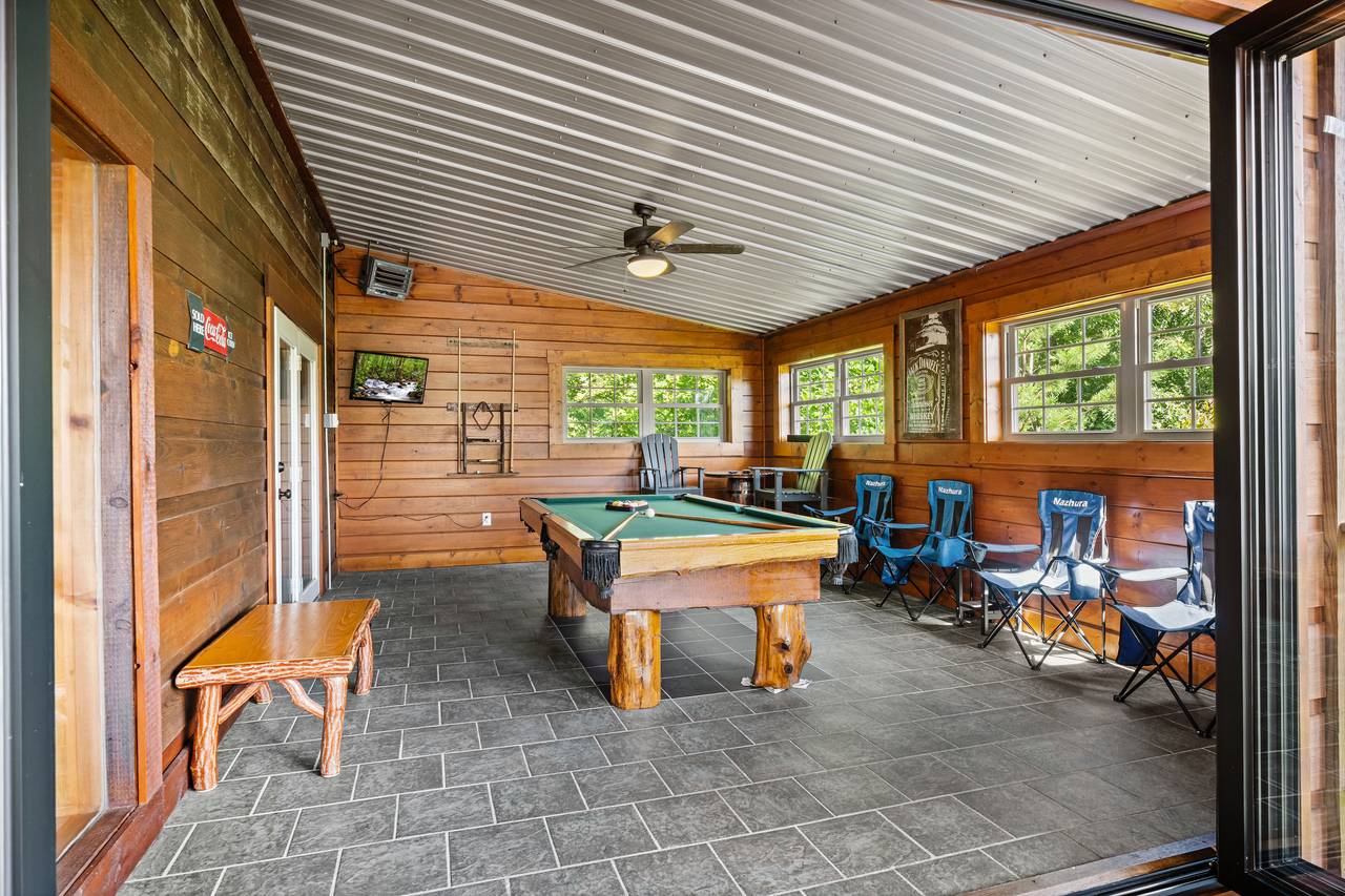 Pool Table in entry level closed-in porch Pool Table in entry level closed-in porch