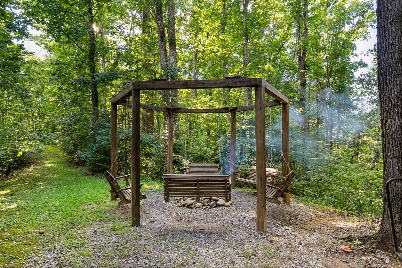 Porch Swings by Fire Pit & Log Seating Porch Swings by Fire Pit & Log Seating
