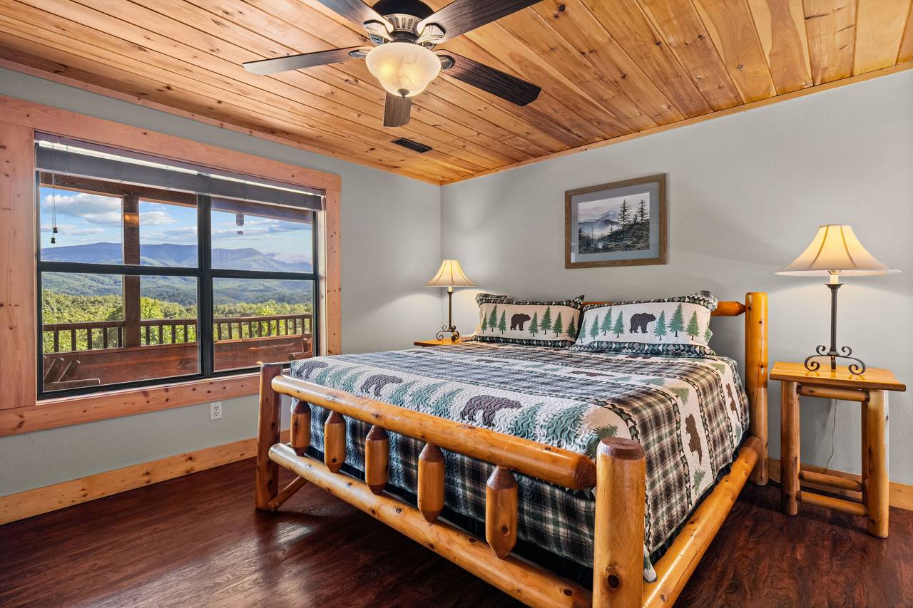 Upper level king bedroom with views, TV, and full bath Upper level king bedroom with views, TV, and full bath