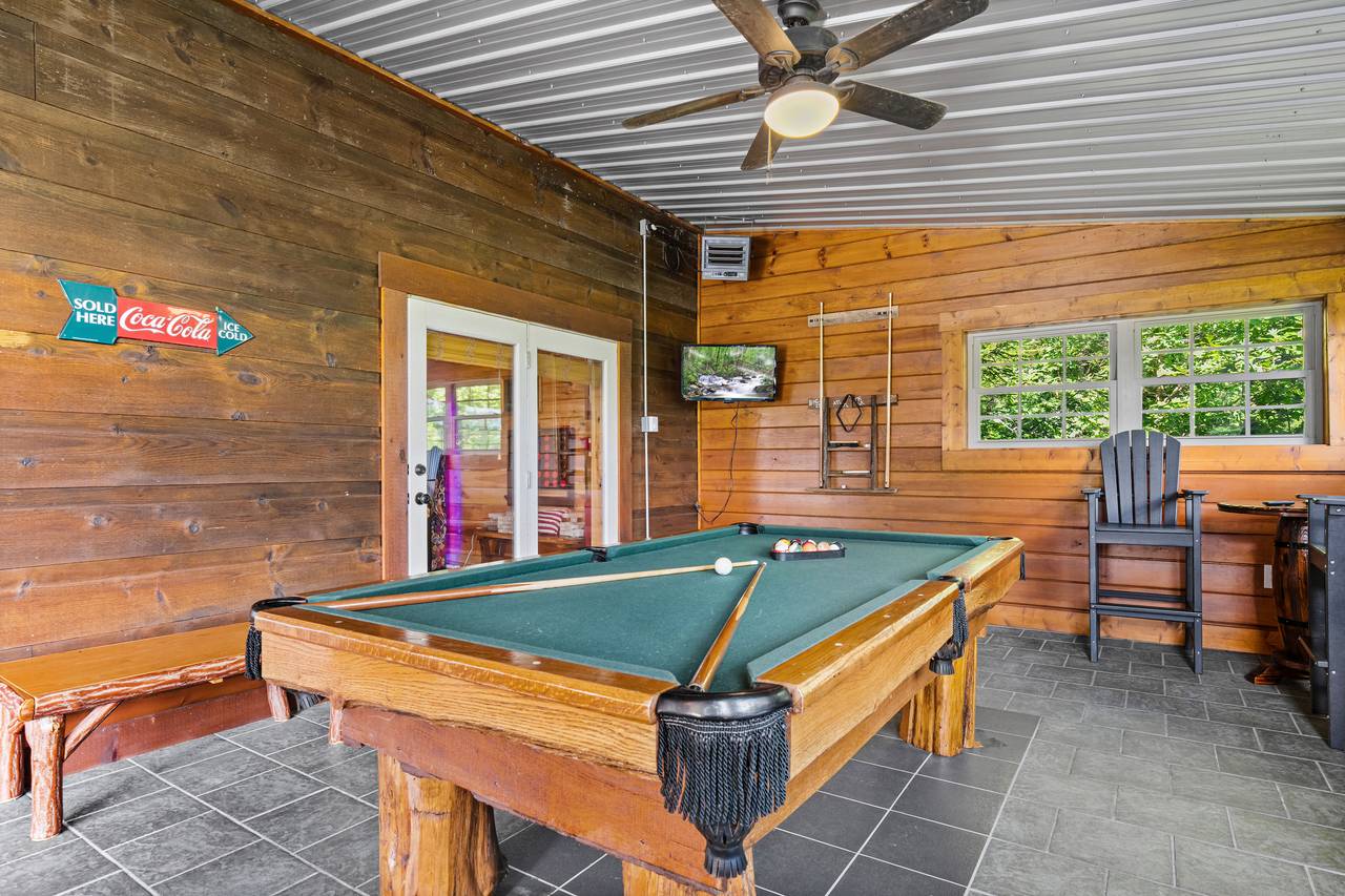 Pool Table in entry level closed-in porch Pool Table in entry level closed-in porch