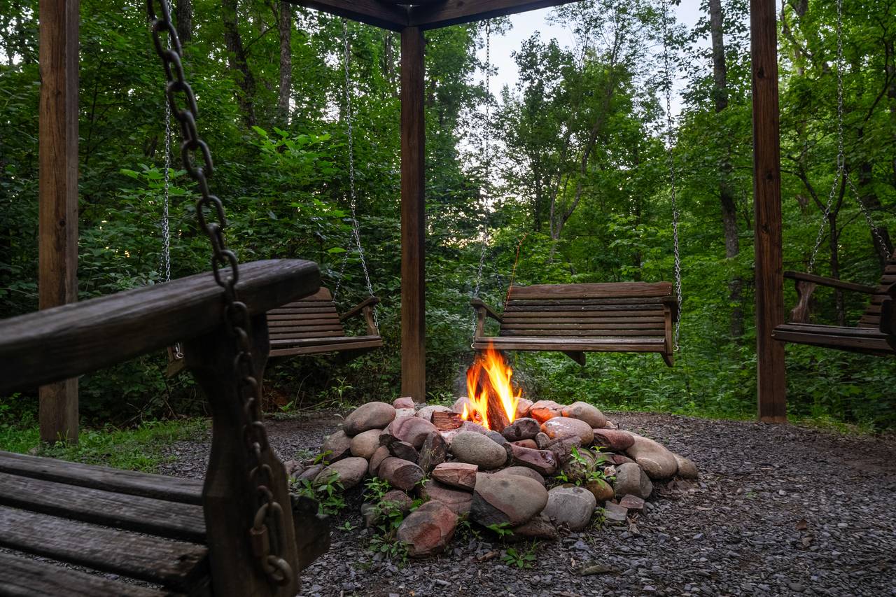 Porch Swings by Fire Pit & Log Seating Porch Swings by Fire Pit & Log Seating