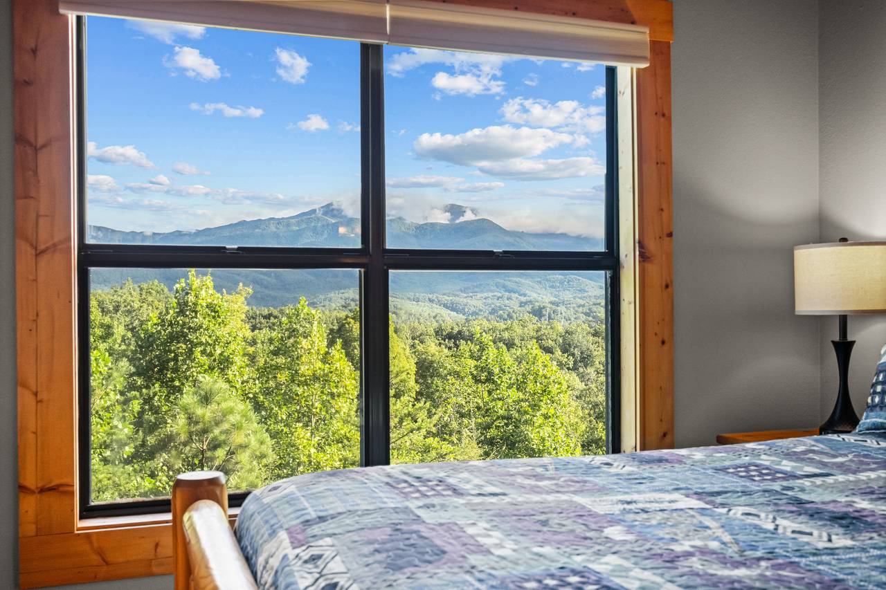 Upper level king bedroom with views, TV, and full bath Upper level king bedroom with views, TV, and full bath