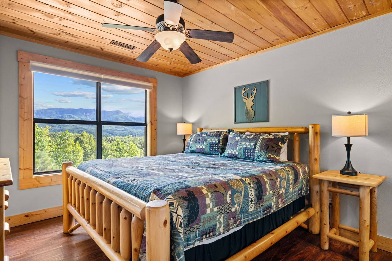 Upper level king bedroom with views, TV, and full bath Upper level king bedroom with views, TV, and full bath