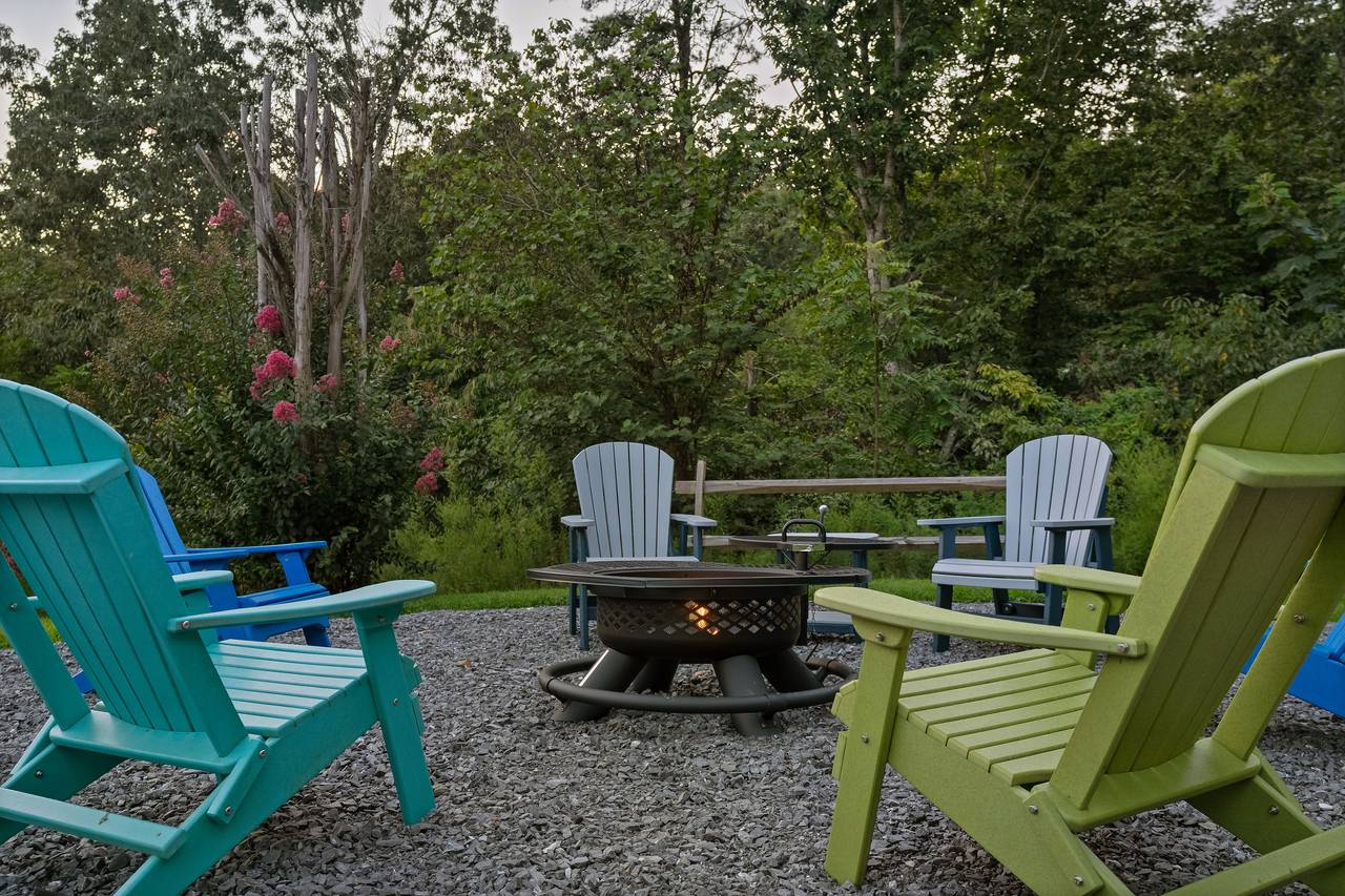 Firepit with chairs for relaxing under the stars Firepit with chairs for relaxing under the stars