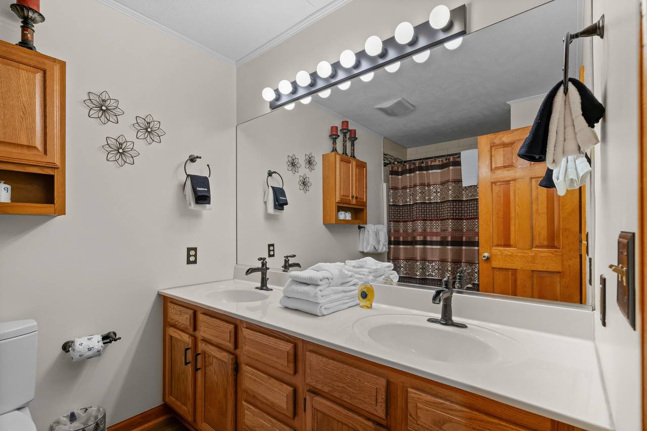 Shared full bath with tub/shower combo Shared full bath with tub/shower combo