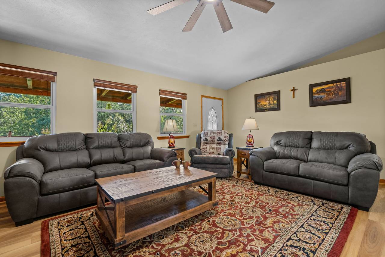 Cozy living room with gas fireplace & TV Cozy living room with gas fireplace & TV