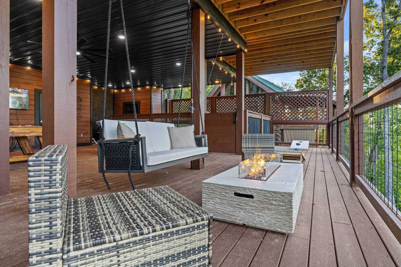 <span class="name">Handcrafted swing beside the glowing firepit</span> <span class="name">Handcrafted swing beside the glowing firepit</span>