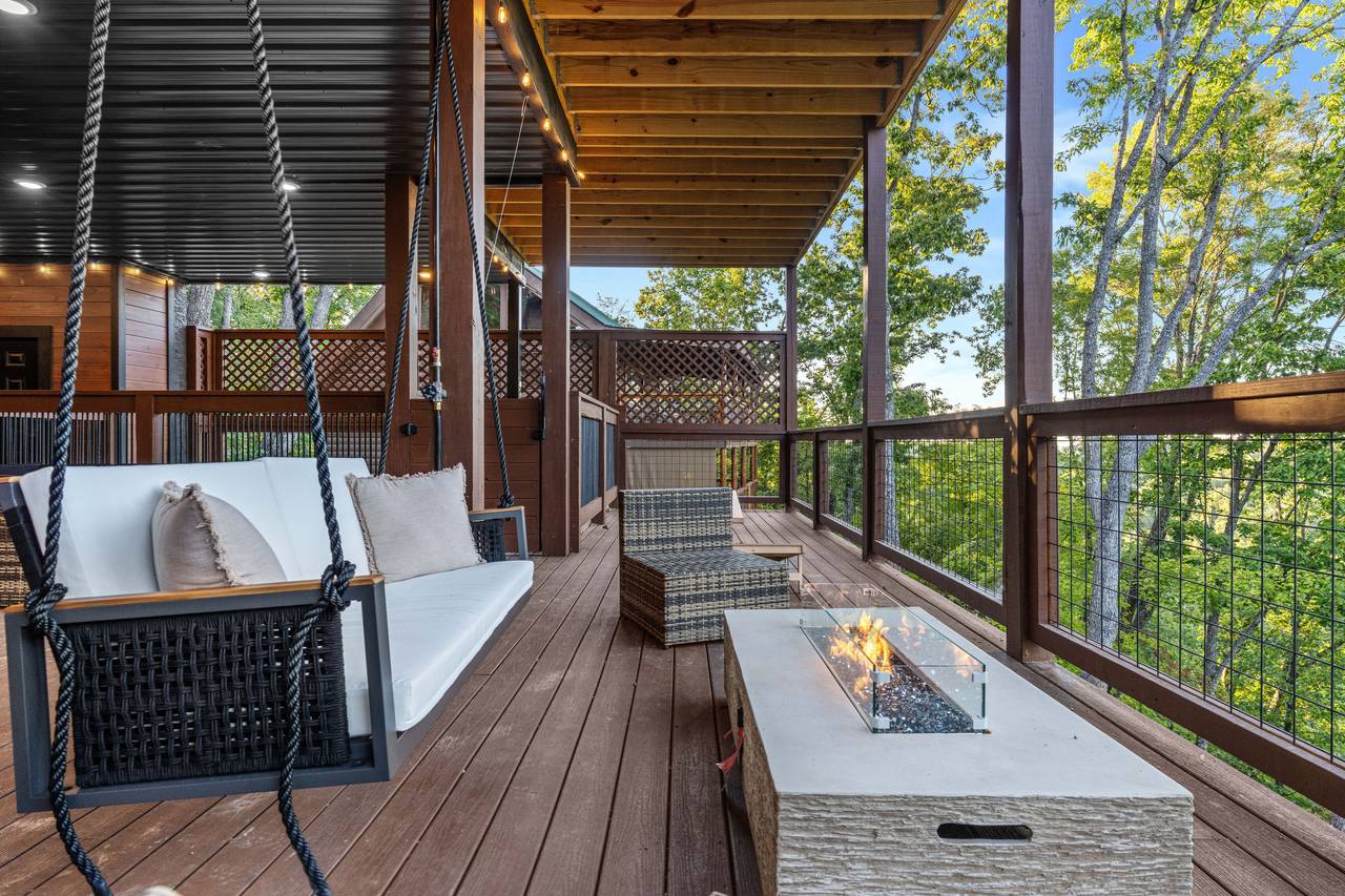<span class="name">Handcrafted swing beside the glowing firepit</span> <span class="name">Handcrafted swing beside the glowing firepit</span>