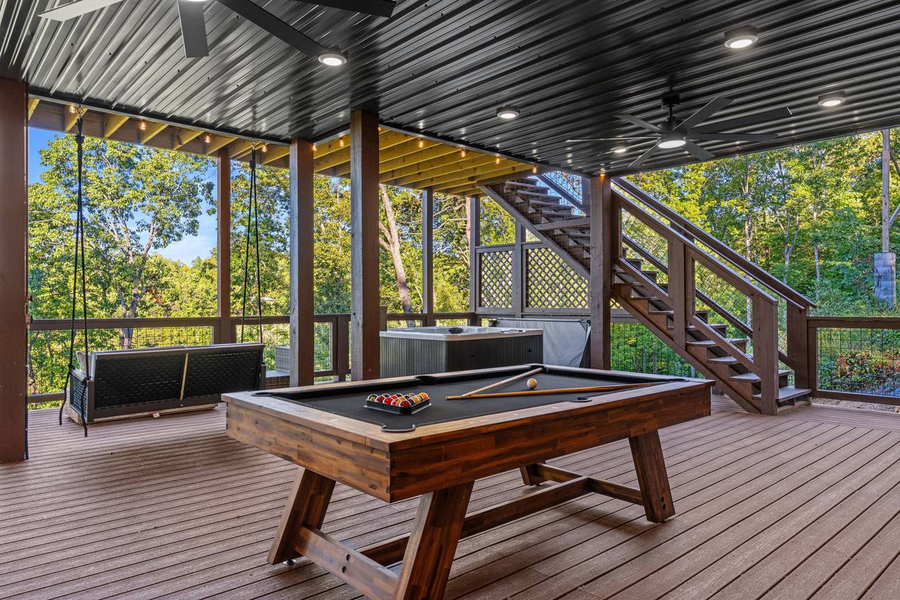 <span class="name">Covered deck with pool table for fun friendly games</span> <span class="name">Covered deck with pool table for fun friendly games</span>