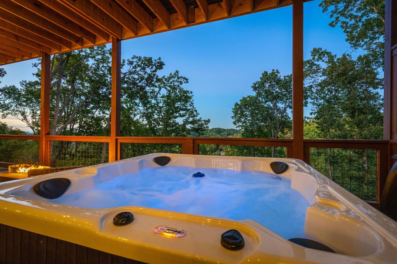 <span class="name">Hot tub under covered deck for year-round enjoyment</span> <span class="name">Hot tub under covered deck for year-round enjoyment</span>
