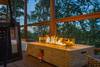 Evening glow from the pool & firelight creates romance Evening glow from the pool & firelight creates romance
