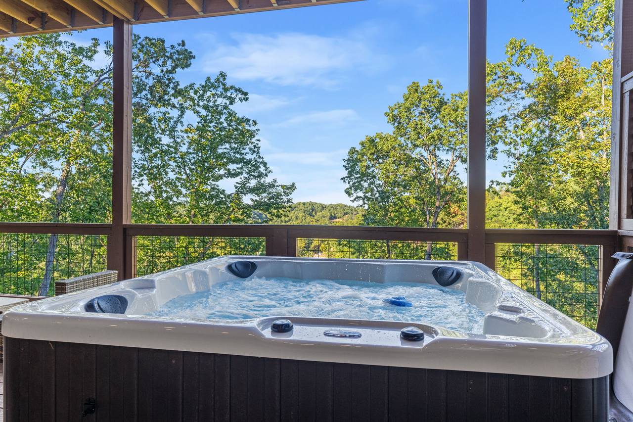 <span class="name">Hot tub under covered deck for year-round enjoyment</span> <span class="name">Hot tub under covered deck for year-round enjoyment</span>