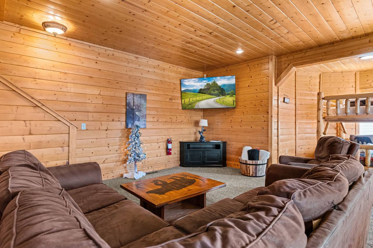 <span class="name">Lower living room with big sectional & mountain vibe</span> <span class="name">Lower living room with big sectional & mountain vibe</span>