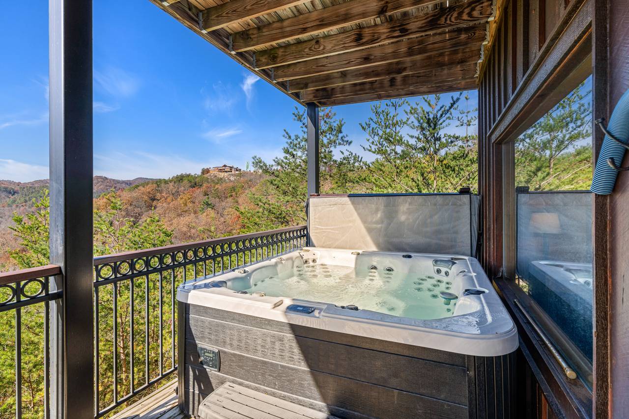 <span class="name">Hot tub with private views of mountains & treetops</span> <span class="name">Hot tub with private views of mountains & treetops</span>
