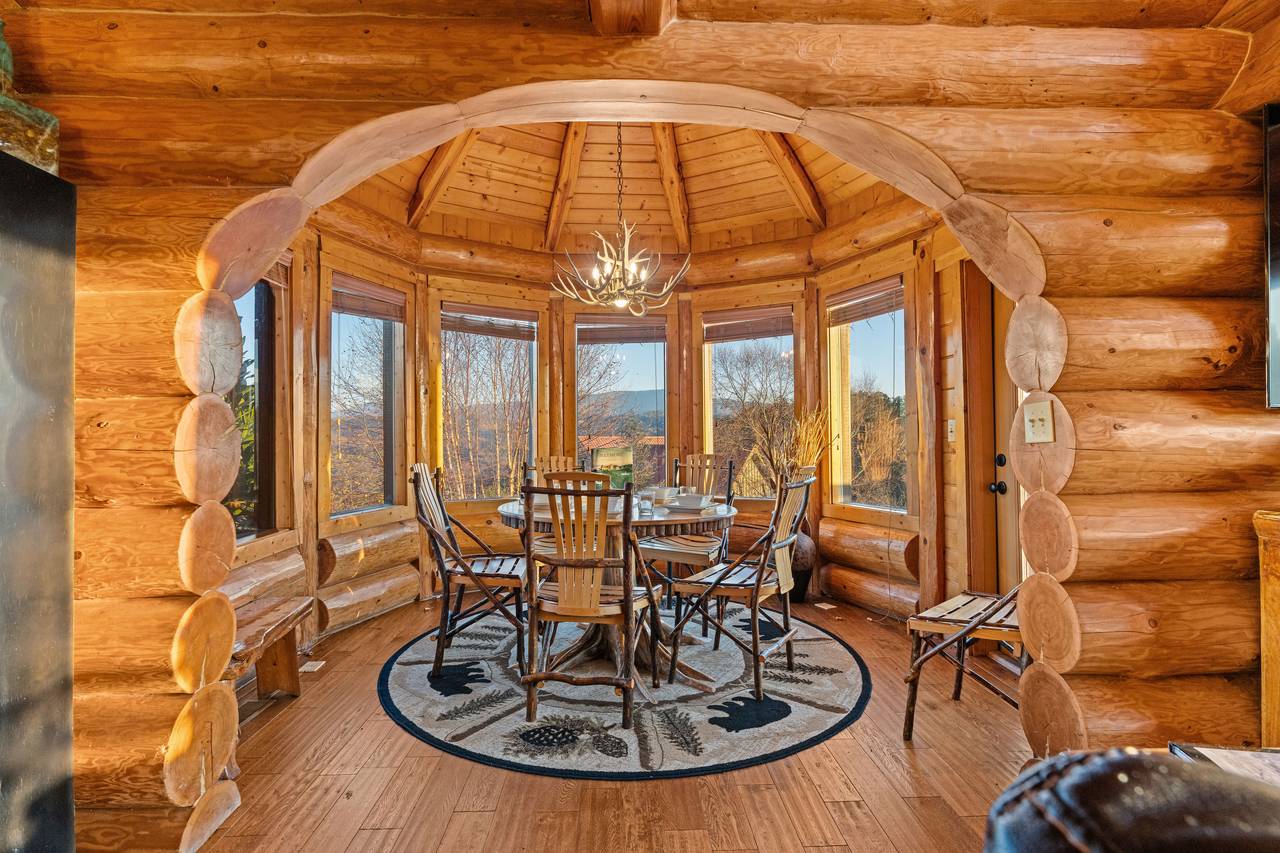 <span class="name">Dining knook with custom log table and chairs</span> <span class="name">Dining knook with custom log table and chairs</span>