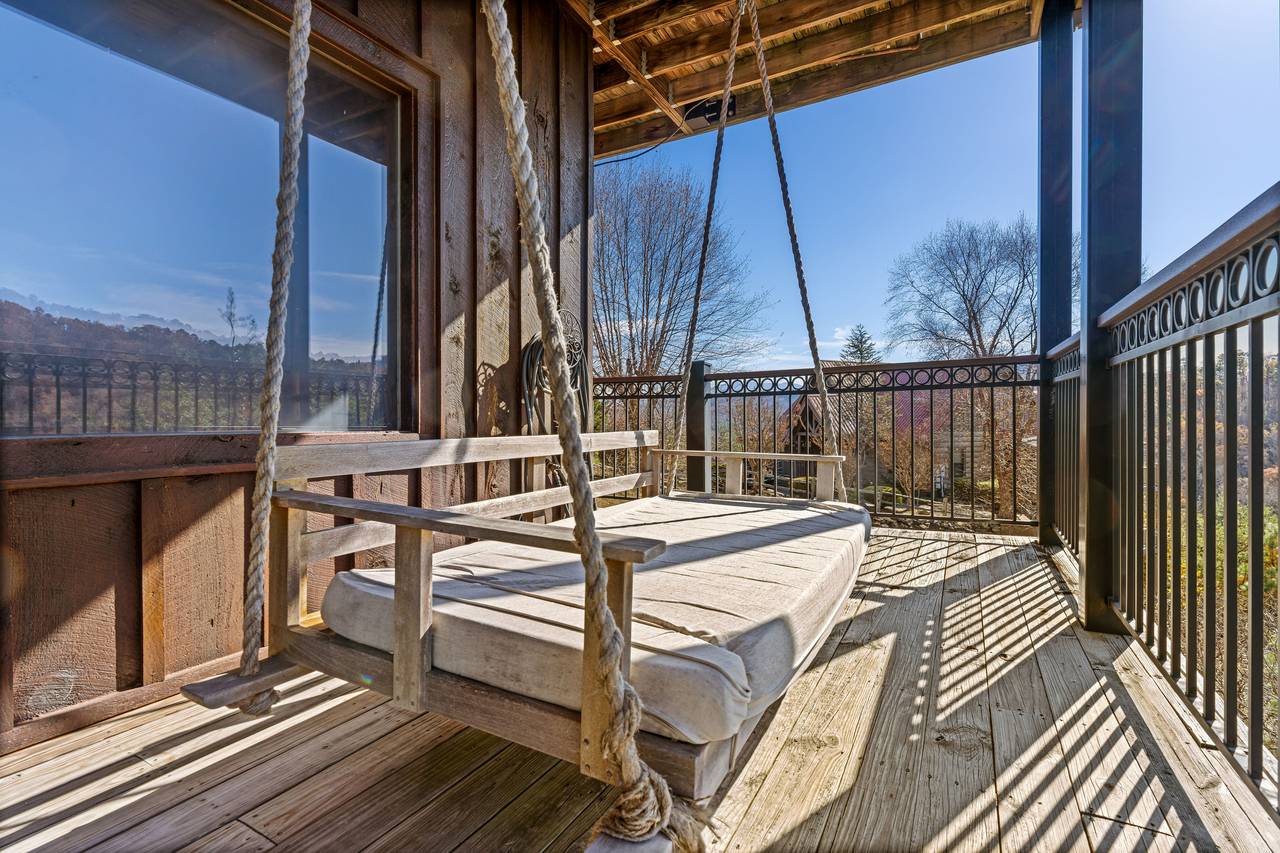 <span class="name">Deck swing overlooking woods & peaceful ridgelines</span> <span class="name">Deck swing overlooking woods & peaceful ridgelines</span>