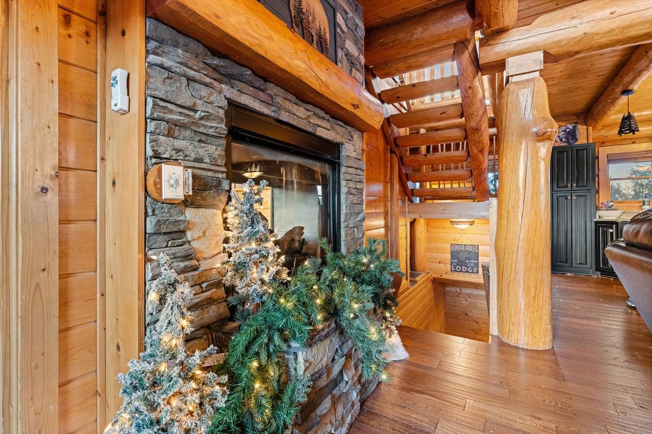 <span class="name">Stone fireplace and stairase</span> <span class="name">Stone fireplace and stairase</span>