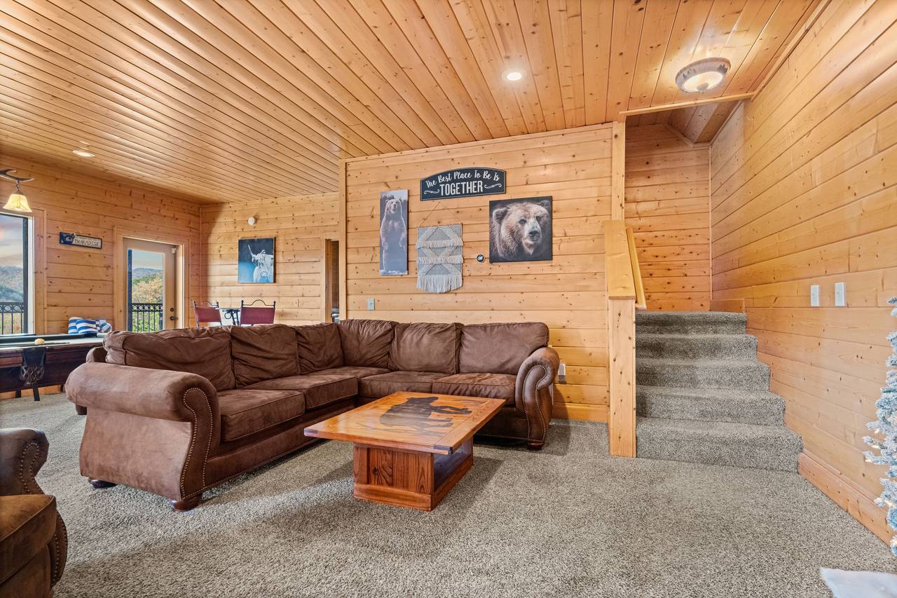 <span class="name">Lower living room with big sectional & mountain vibe</span> <span class="name">Lower living room with big sectional & mountain vibe</span>