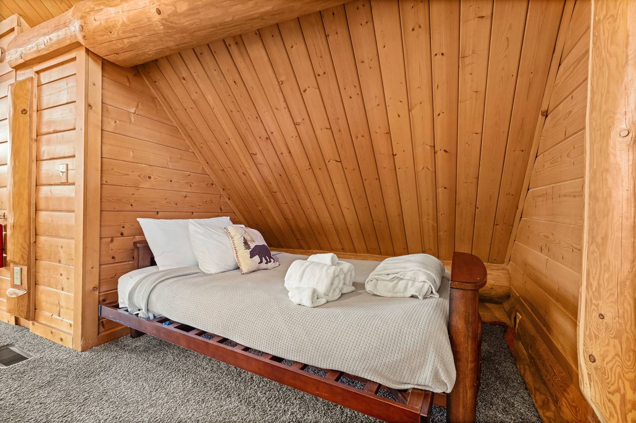<span class="name">Loft futon tucked in a cozy nook with a peaceful cabin vibe</span> <span class="name">Loft futon tucked in a cozy nook with a peaceful cabin vibe</span>