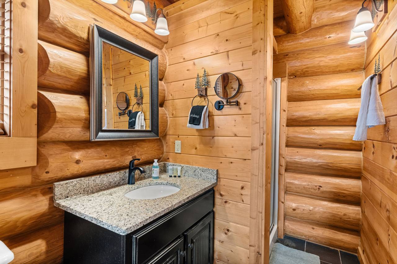 <span class="name">Main-level bath with warm wood accents & standing shower</span> <span class="name">Main-level bath with warm wood accents & standing shower</span>