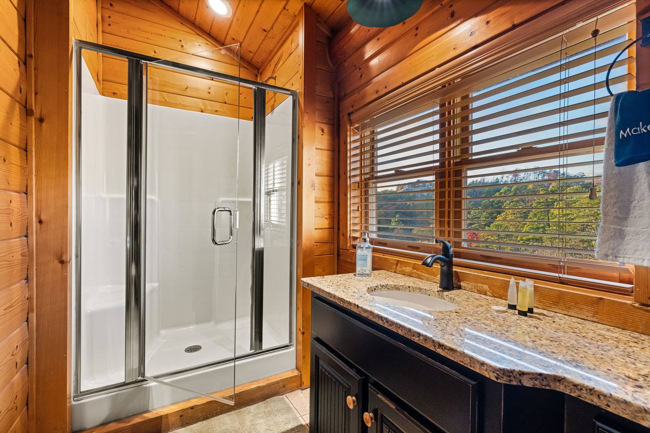 <span class="name">Upper bath with rustic finishes & walk-in shower</span> <span class="name">Upper bath with rustic finishes & walk-in shower</span>