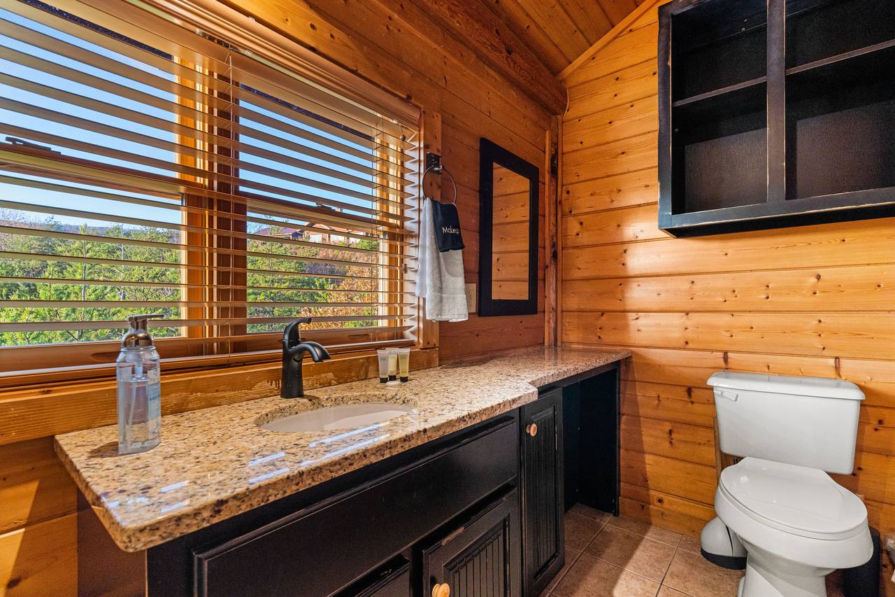 <span class="name">Upper bath with rustic finishes & walk-in shower</span> <span class="name">Upper bath with rustic finishes & walk-in shower</span>