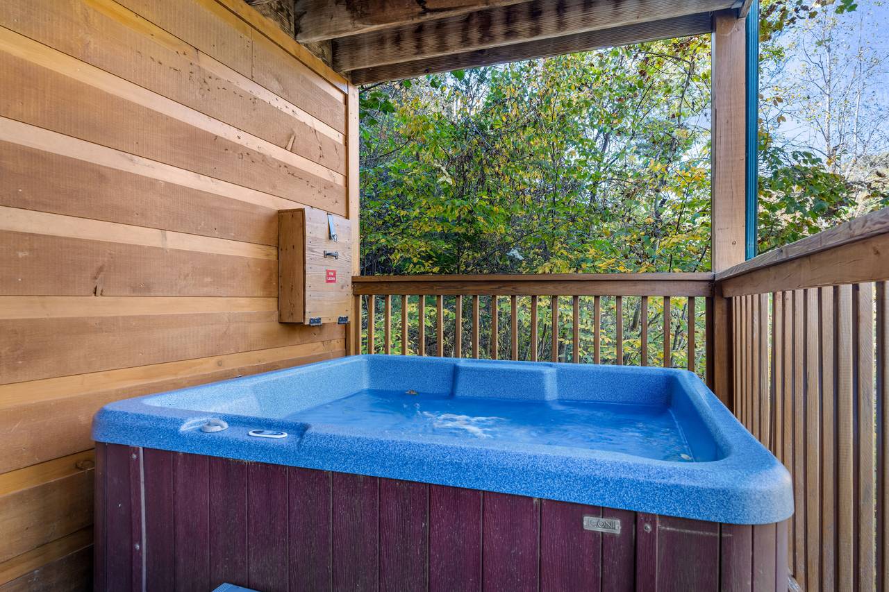 Relax in the bubbling hot tub beneath the stars Relax in the bubbling hot tub beneath the stars
