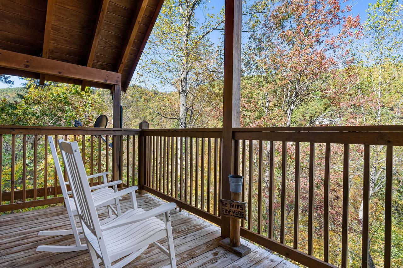 Upper level deck with rocking chairs Upper level deck with rocking chairs