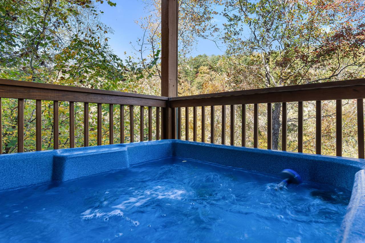 Relax in the bubbling hot tub beneath the stars Relax in the bubbling hot tub beneath the stars