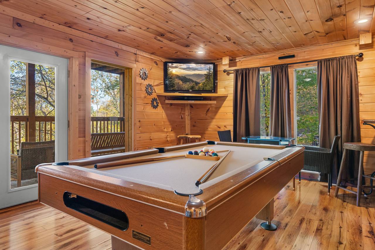 Game room with pool table & arcade fun for all ages Game room with pool table & arcade fun for all ages