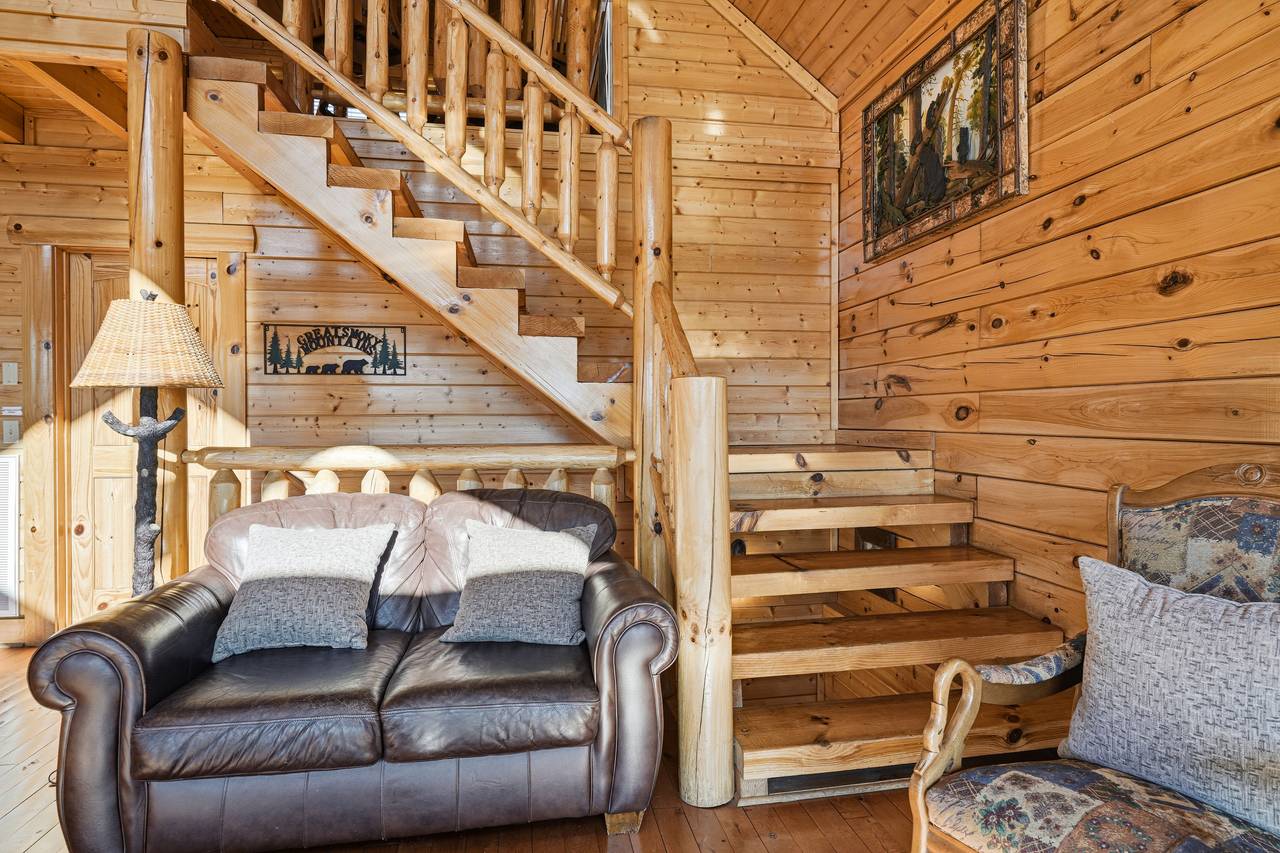 <span class="name">Staircase to upper-level loft</span> <span class="name">Staircase to upper-level loft</span>