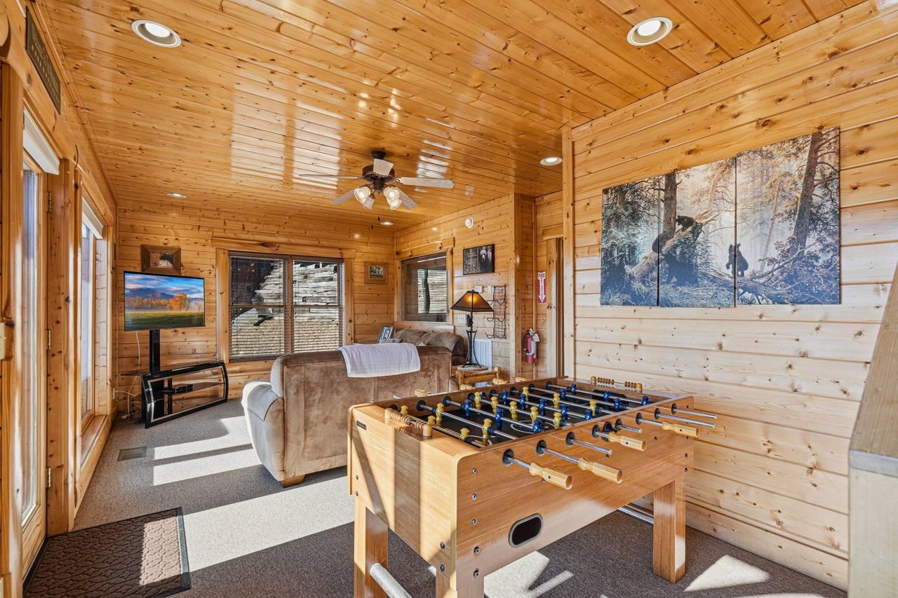 <span class="name">Lower-Level family room w/foosball, couch, TV & mountain views</span> <span class="name">Lower-Level family room w/foosball, couch, TV & mountain views</span>