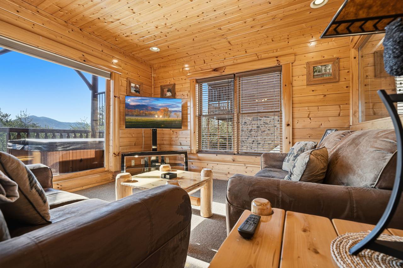 <span class="name">Lower-Level family room w/foosball, couch, TV & mountain views</span> <span class="name">Lower-Level family room w/foosball, couch, TV & mountain views</span>