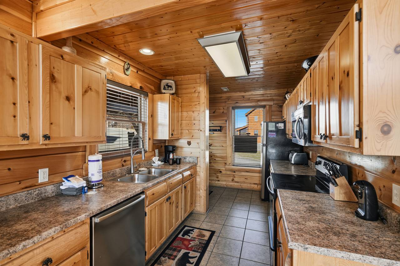 <span class="name">Fully equipped kitchen with island seating</span> <span class="name">Fully equipped kitchen with island seating</span>