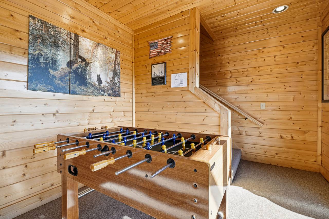 <span class="name">Lower level entertainment room with foosball table</span> <span class="name">Lower level entertainment room with foosball table</span>
