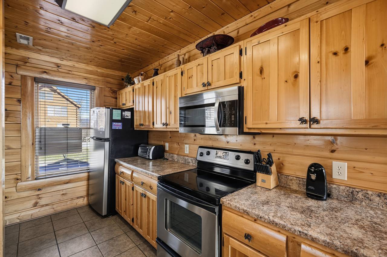 <span class="name">Fully equipped kitchen with island seating</span> <span class="name">Fully equipped kitchen with island seating</span>