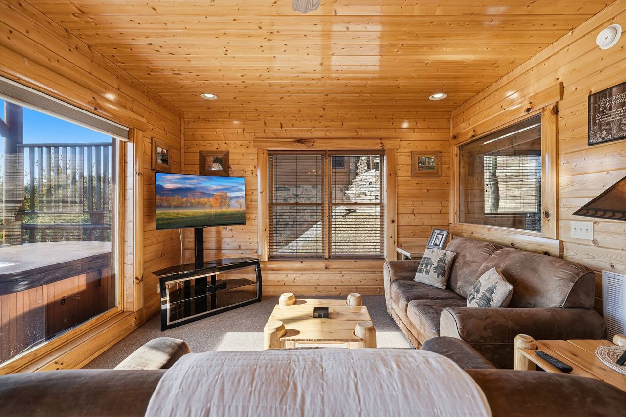 <span class="name">Lower-Level family room w/foosball, couch, TV & mountain views</span> <span class="name">Lower-Level family room w/foosball, couch, TV & mountain views</span>