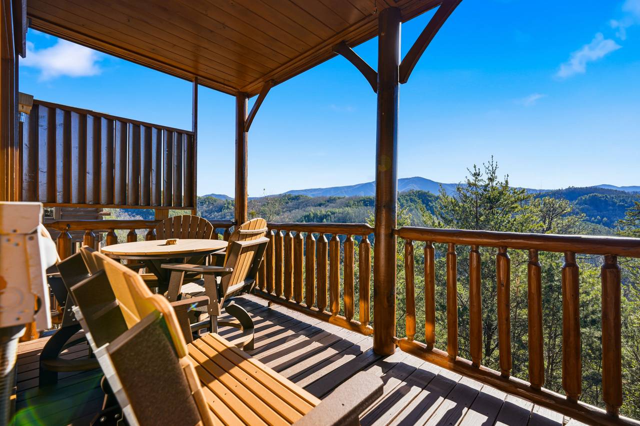 <span class="name">Outdoor rocking bench overlooking mountains</span> <span class="name">Outdoor rocking bench overlooking mountains</span>