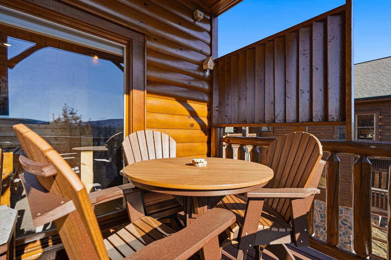 <span class="name">Covered deck with seating & scenic views</span> <span class="name">Covered deck with seating & scenic views</span>