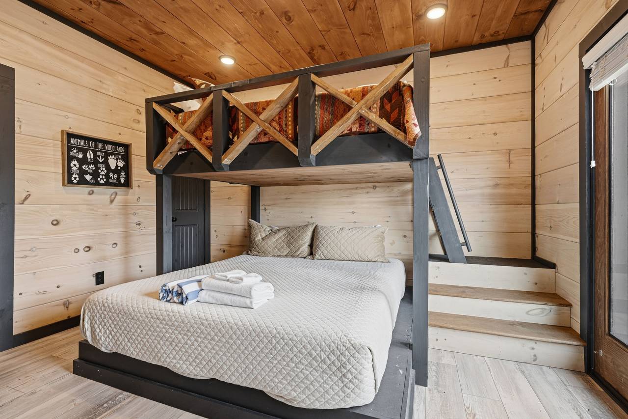 <span class="name">Bedroom 3 bunk room with queen-over-king bunkbed</span> <span class="name">Bedroom 3 bunk room with queen-over-king bunkbed</span>