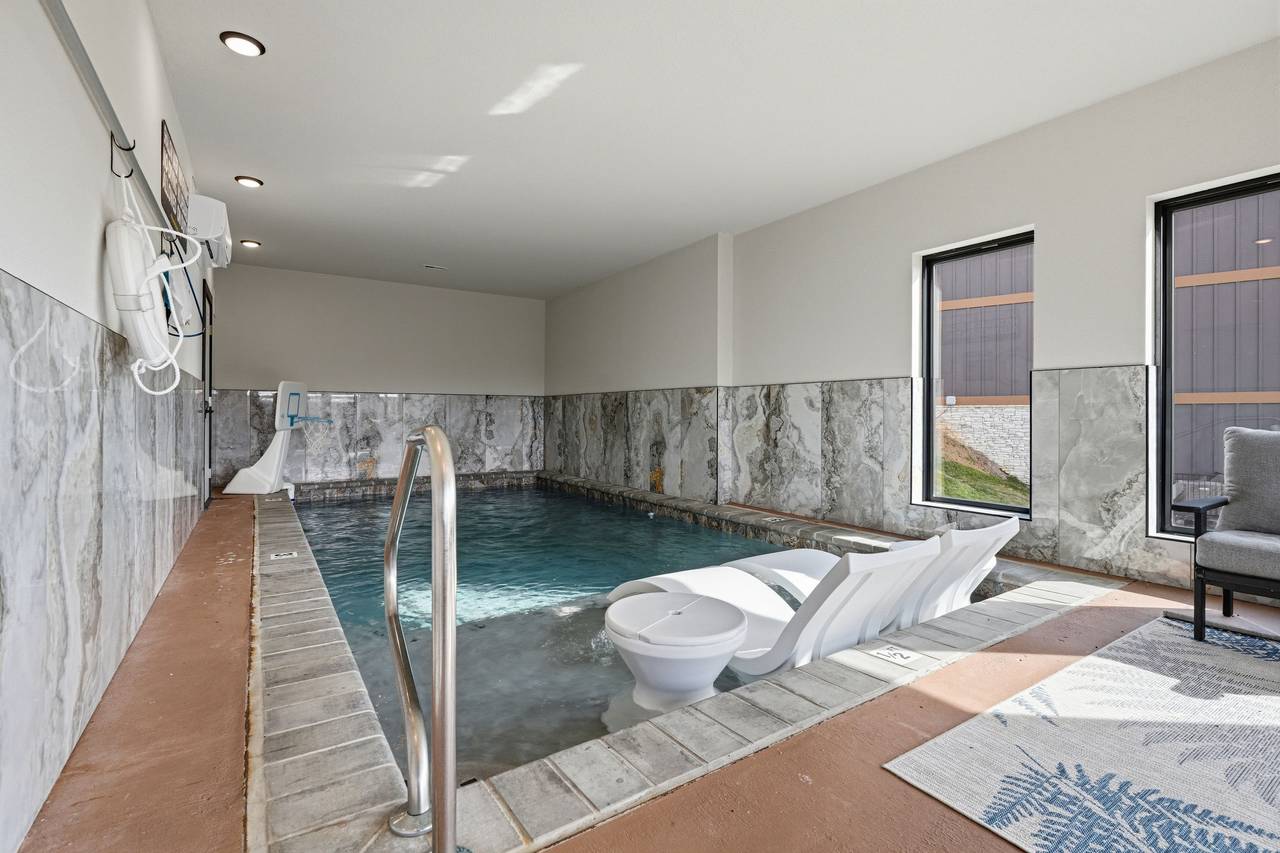 <span class="name">Private indoor heated pool for year-round swimming</span> <span class="name">Private indoor heated pool for year-round swimming</span>