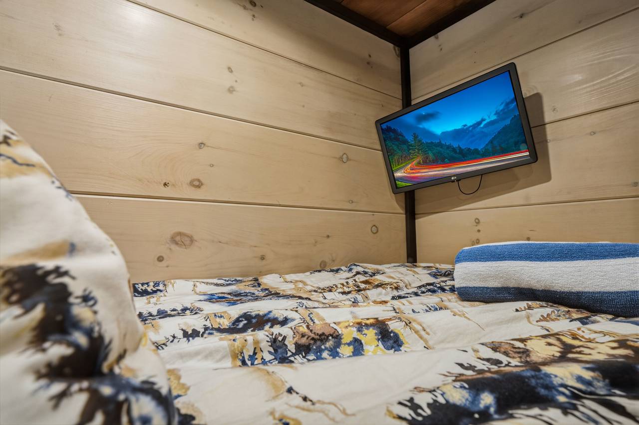 <span class="name">Game room bunk area with twin-over-twin bunk beds</span> <span class="name">Game room bunk area with twin-over-twin bunk beds</span>