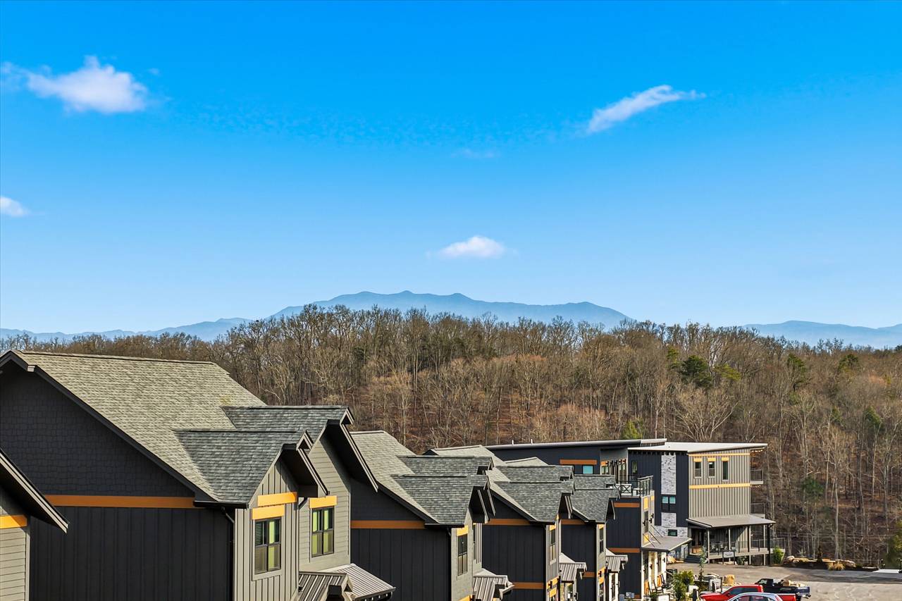 <span class="name">Covered decks with outdoor seating & Smoky Mountain views</span> <span class="name">Covered decks with outdoor seating & Smoky Mountain views</span>