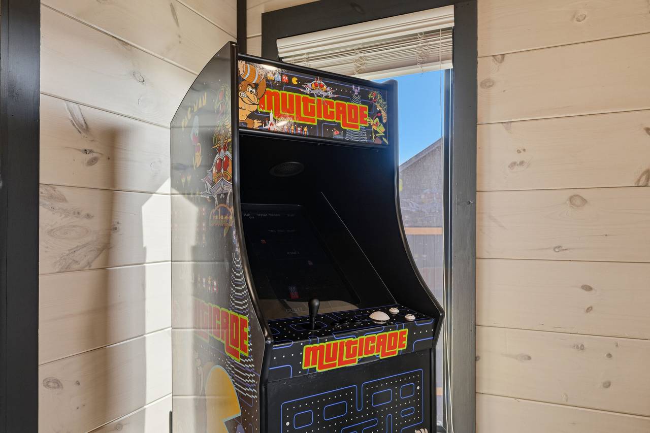 <span class="name">Game room lounge with Smart TV, 2 arcades, & poker table</span> <span class="name">Game room lounge with Smart TV, 2 arcades, & poker table</span>