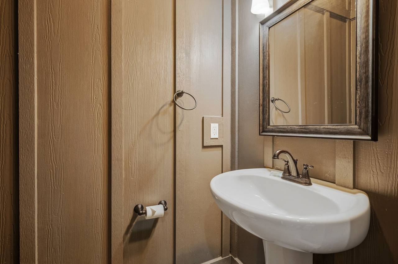 <span class="name">Half bath in the lower level off the pool </span> <span class="name">Half bath in the lower level off the pool </span>